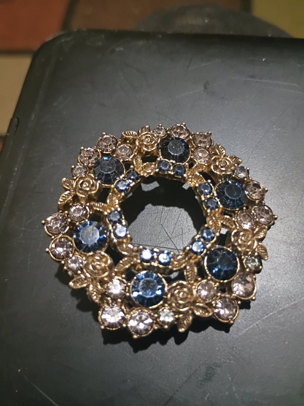 Source Unknown Gold-Tone Floral Wreath Brooch with Blue and Clear Stones